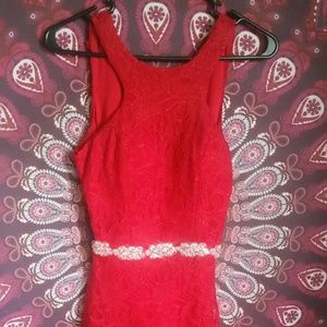 Skin tight, knee high red dress